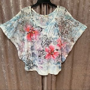 Butterfly blouse with floral and lace pattern